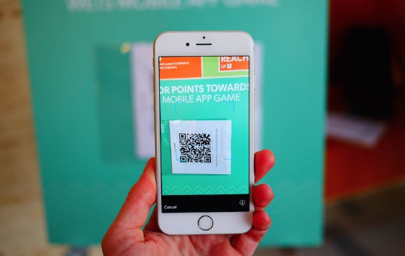 3-conference-app-gamification-hunt-clue-scan-QR Scanning QR code with ScanHunt app at conference